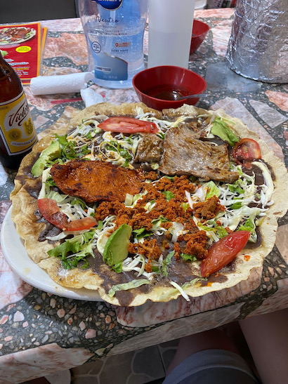 Delicious Tlayuda with 3 different meats @Mercado 20 de Noviembre