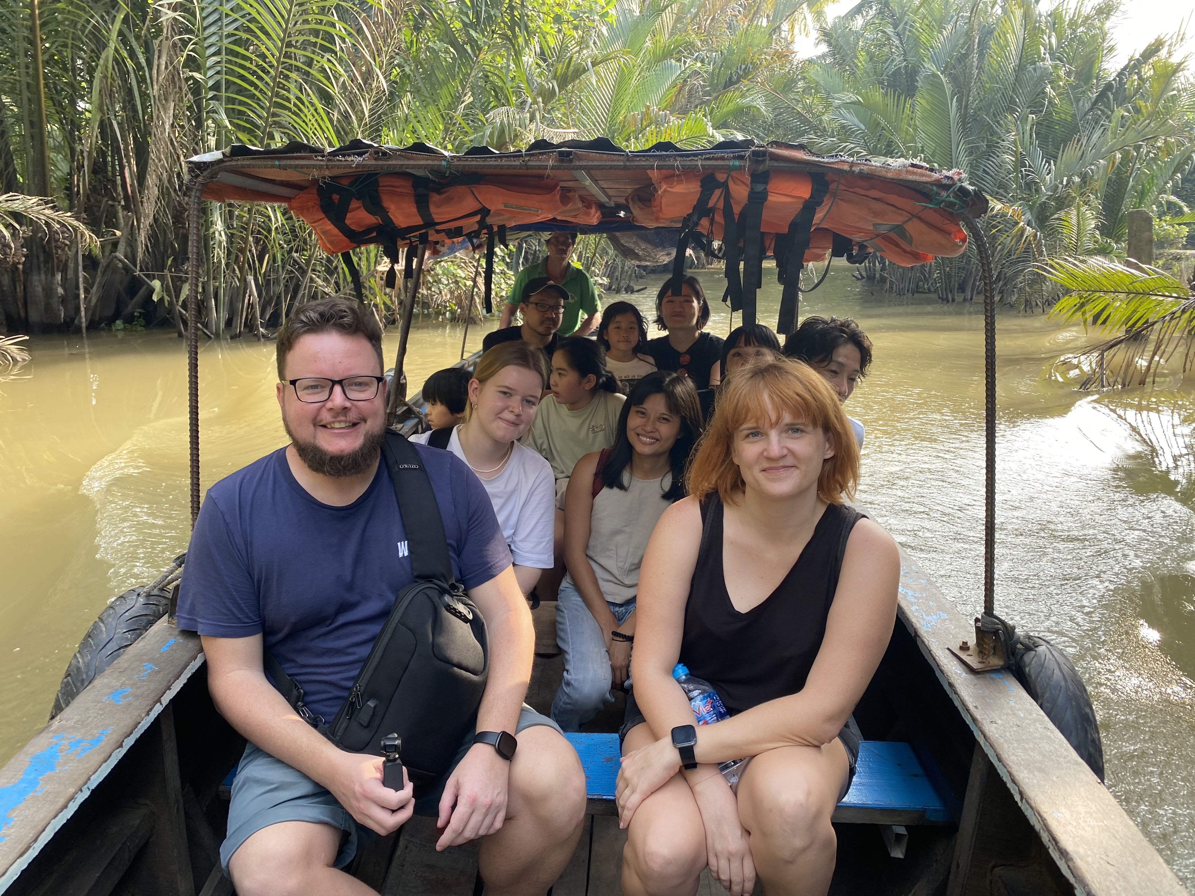 Connecting with people on a small boat in Vietnam